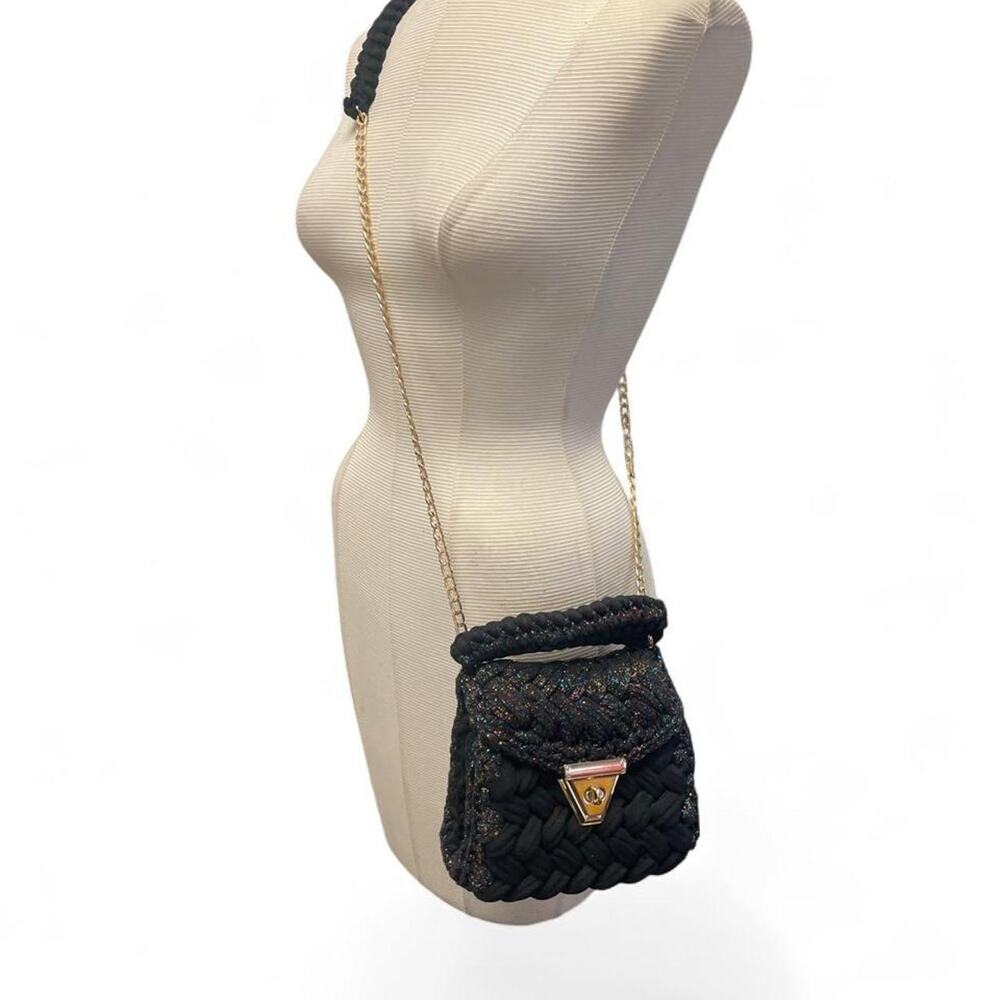 Black braided handbag with glittery